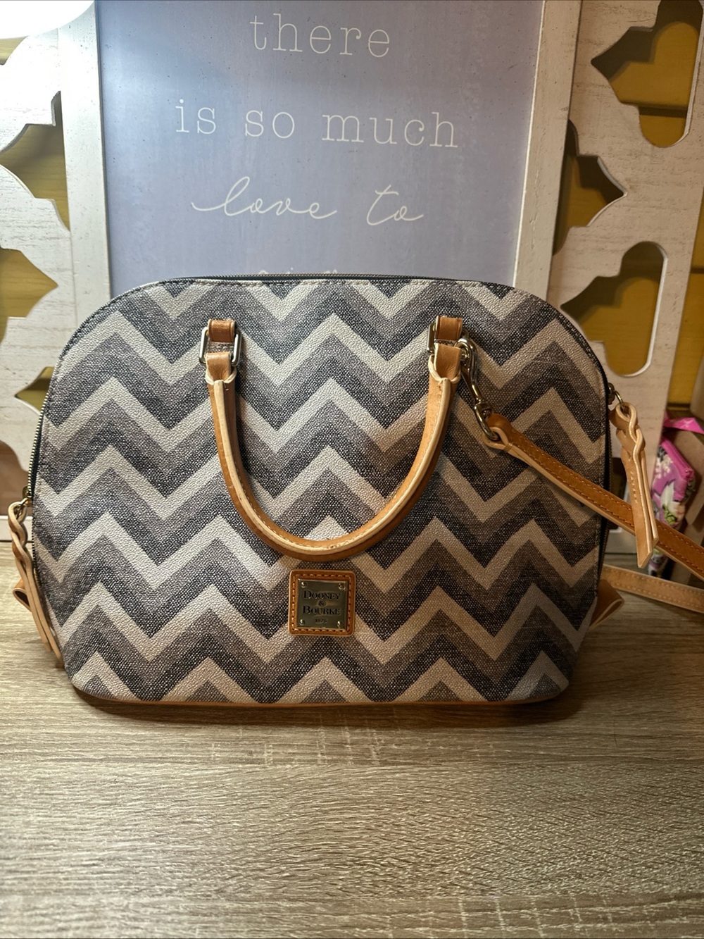 Dooney & Bourke Chevron Satchel Bag in a gray and white pattern.
